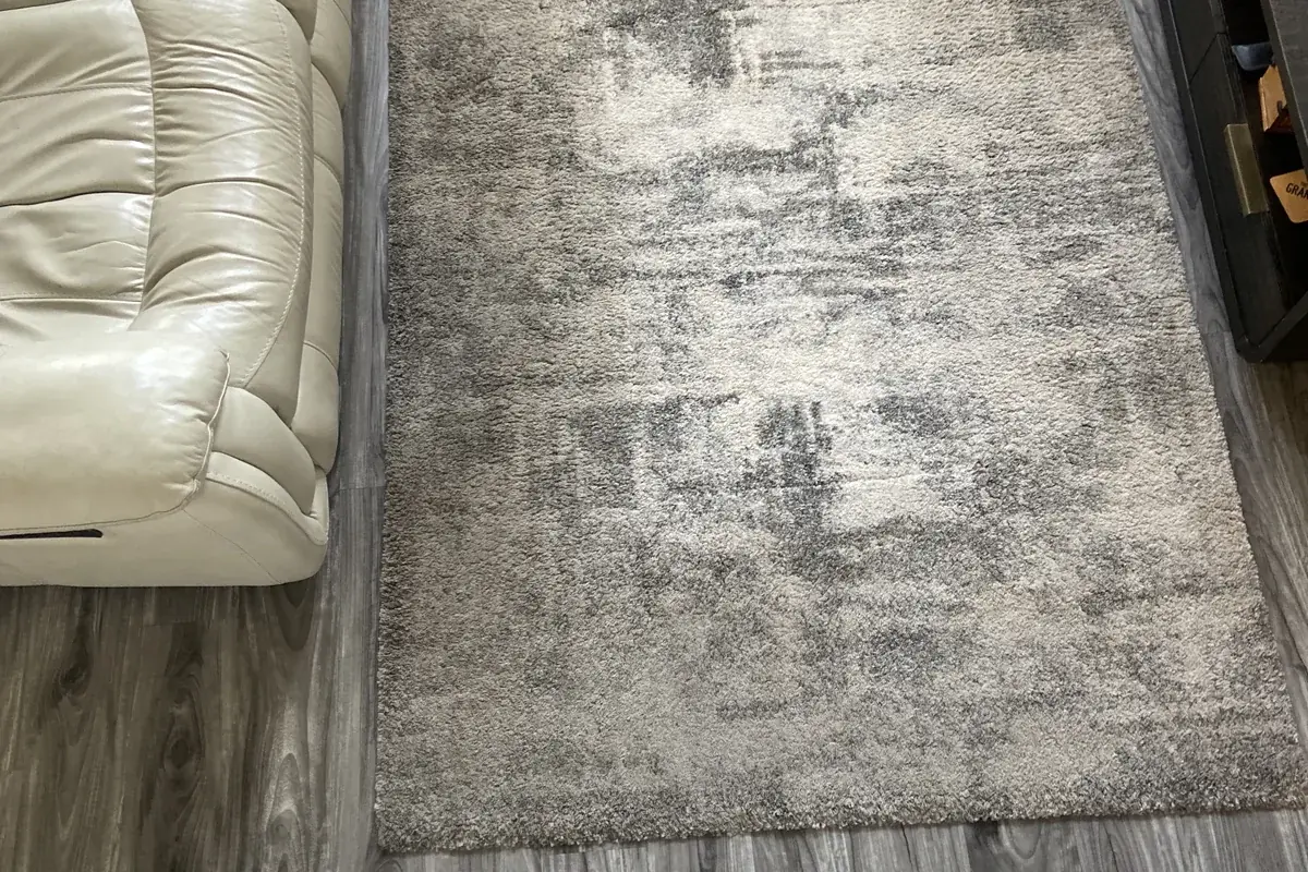 Stained carpet before cleaning in Northbrook
