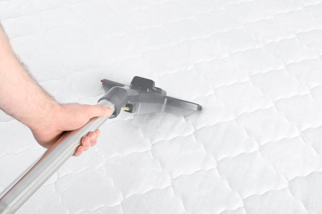 cleaning a white mattress